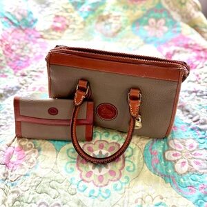 Dooney and Bourke leather handbag/satchel with matching billfold/wallet
